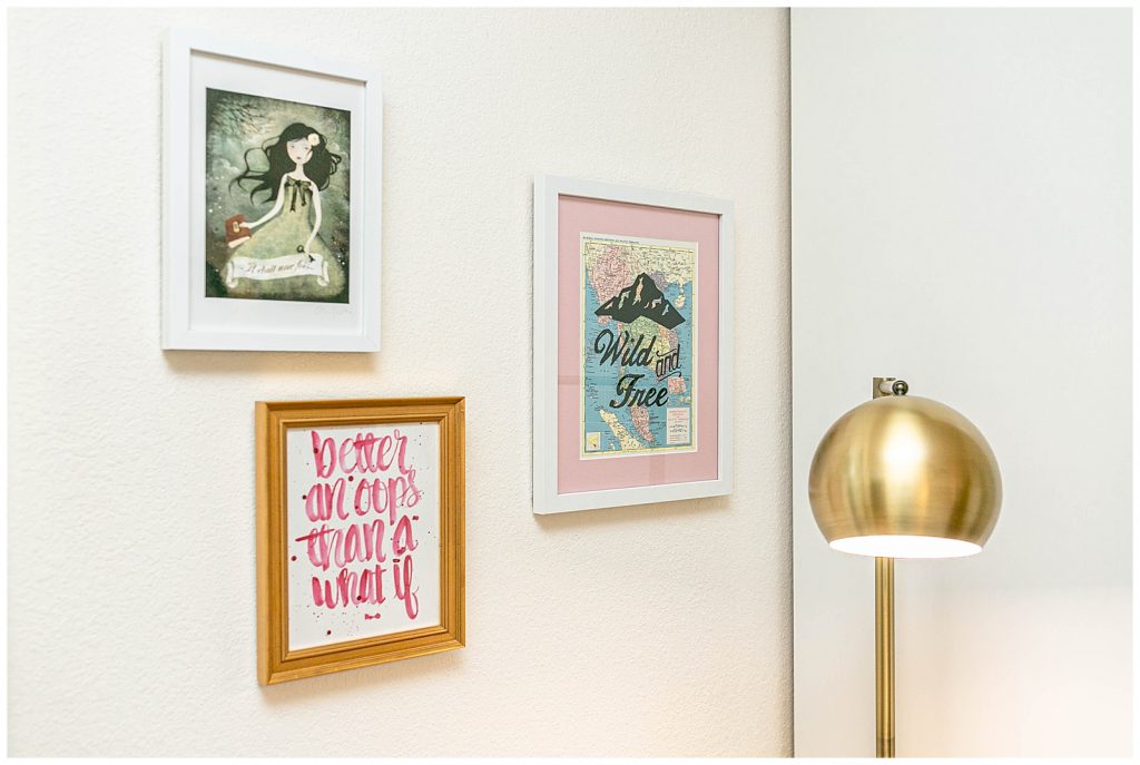 Framed prints and reading lamp