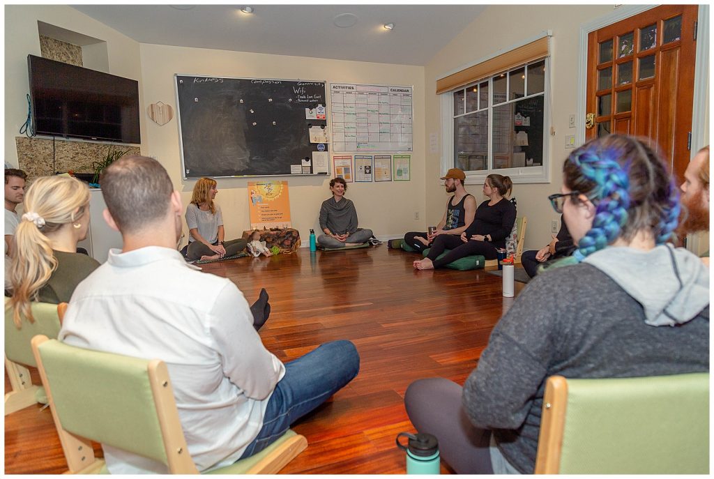 prenatal yoga and childbirth education class, couples sitting around in a circle in a small room