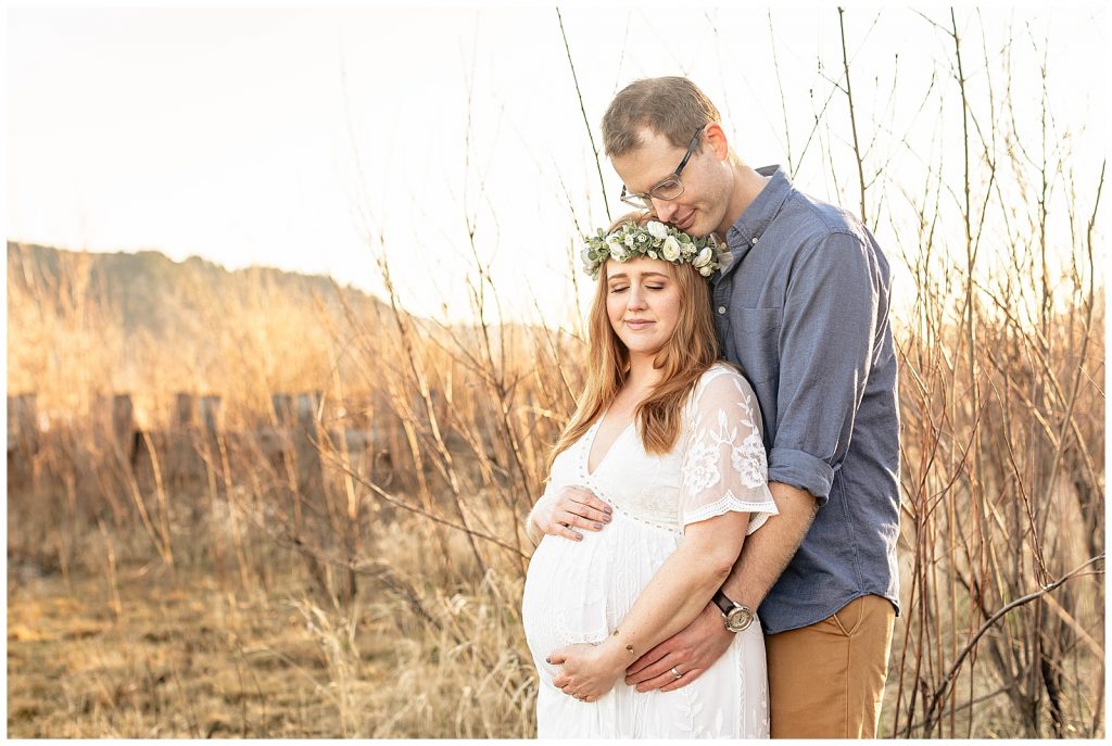 Maternity portraits, Mom in white dress, dad in blue shirt and khaki pants