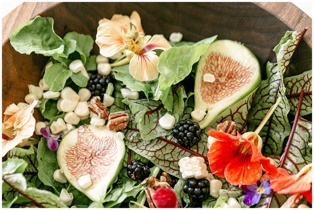 gorgeous fresh summer salad with figs, blackberries, and edible flowers from the garden