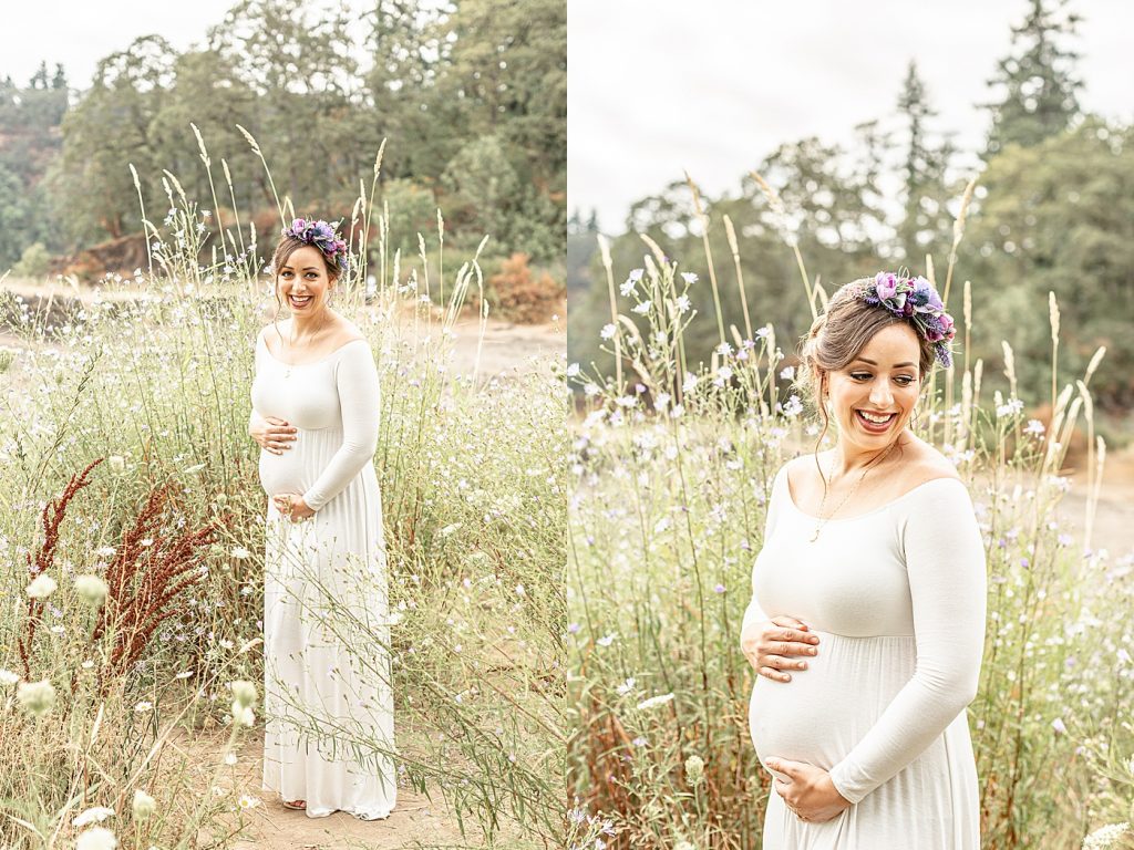 White skinned pregnant woman in white dress in a flower field
