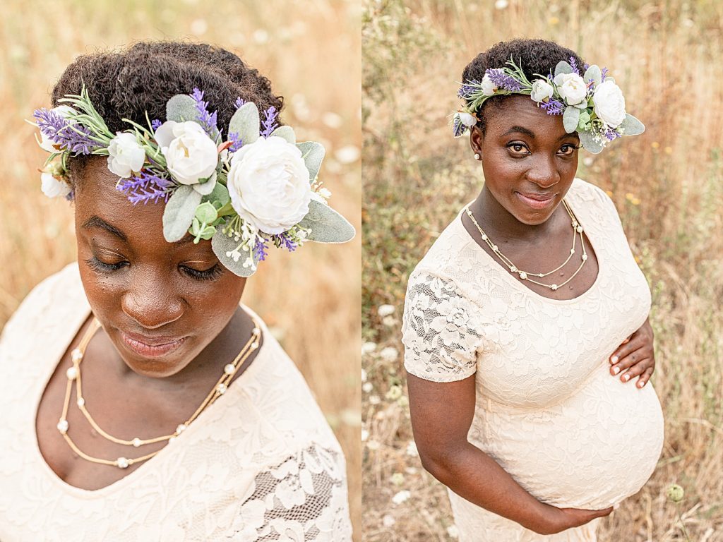 Black skinned pregnant woman out in nature with floral crown