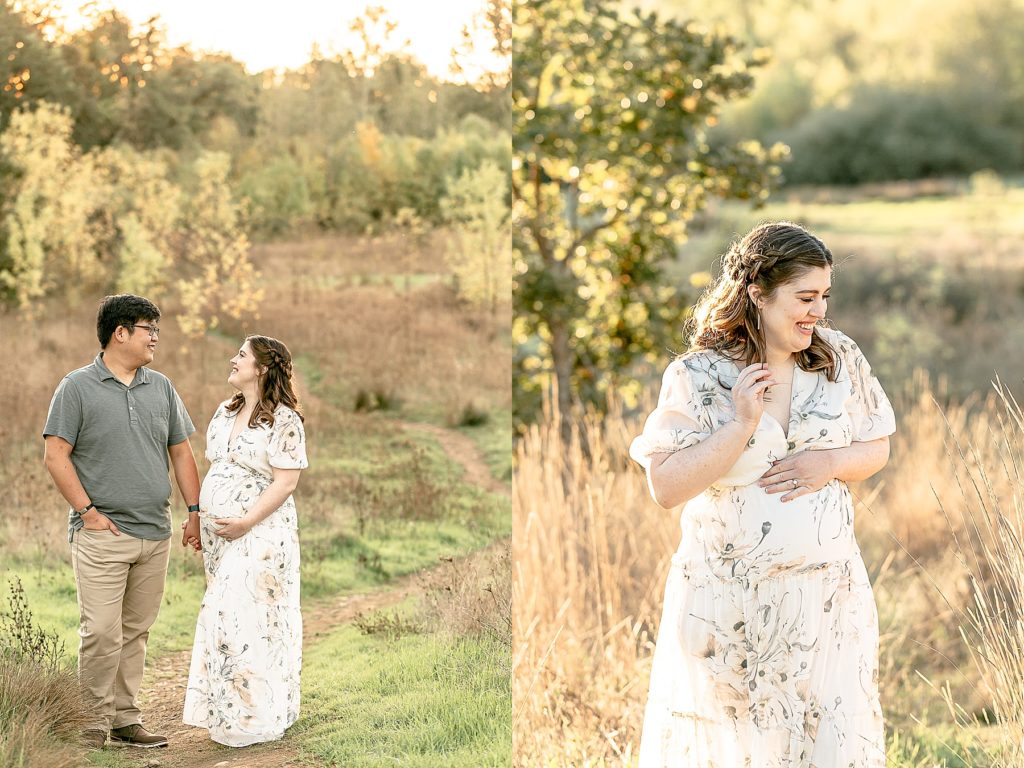 asian man in sage green shirt & khaki pants and light-skinned woman in white floral dress out in nature during their portland oregon maternity session