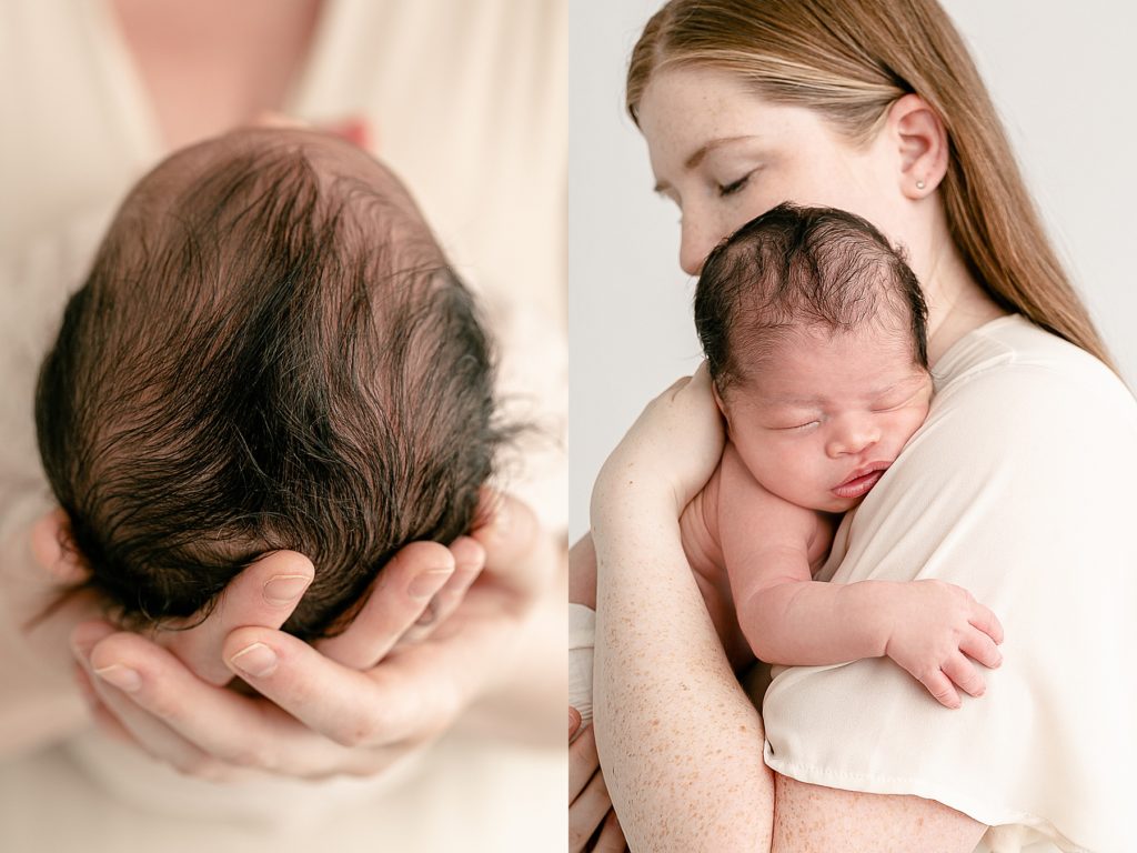 Mom holding baby at newborn photography session.
