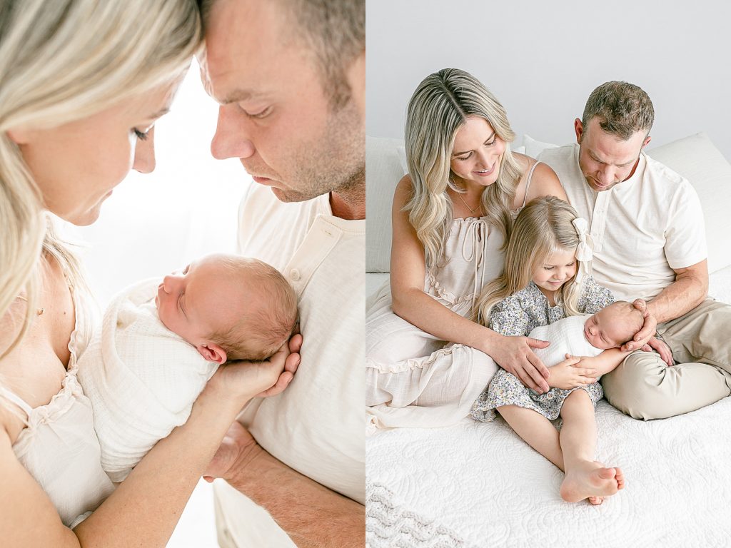 light-skinned family looking at newborn baby all wearing light, neutral colors family newborn portraits
