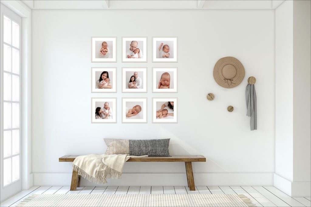 Collage of 3 rows of 3 framed photographs up on a wall with a bench underneath and a hat and coat hooks to the side of the gallery wall. 