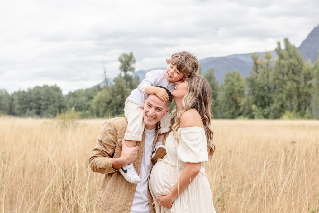 Parents and children sharing natural moments during a Portland family photo session