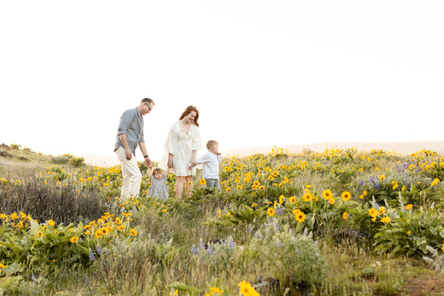 Family walking together in a Portland park during a relaxed photo session