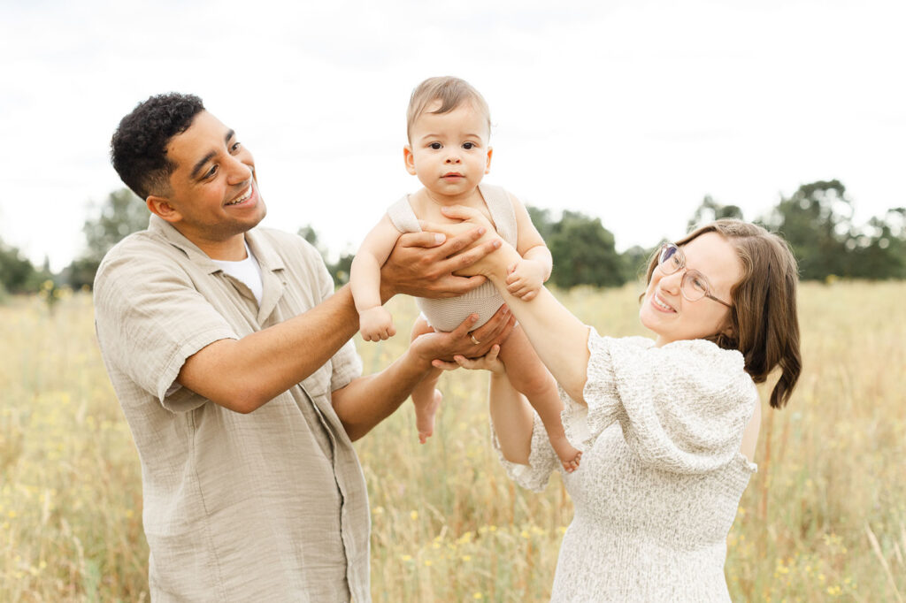 Family in comfortable coordinated clothing for photos