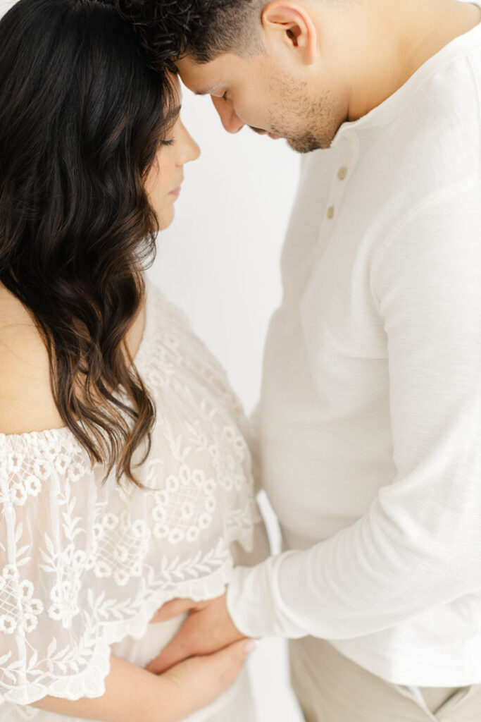 Portland outdoor maternity session featuring an expecting mother in a flowing dress