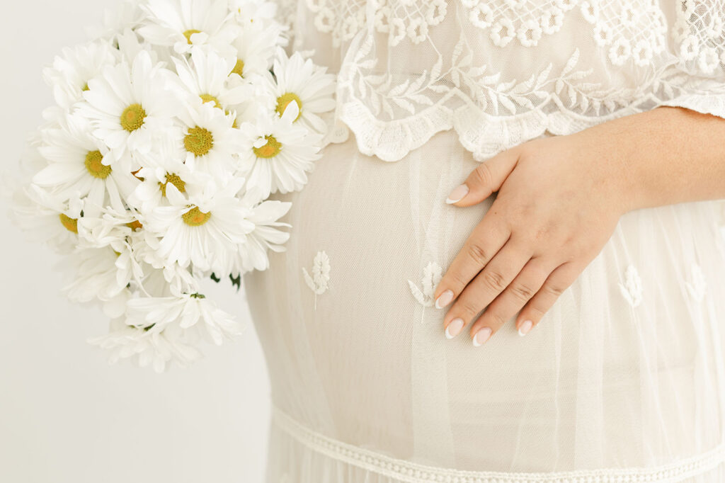Expecting mother celebrating pregnancy with a natural maternity portrait in Portland