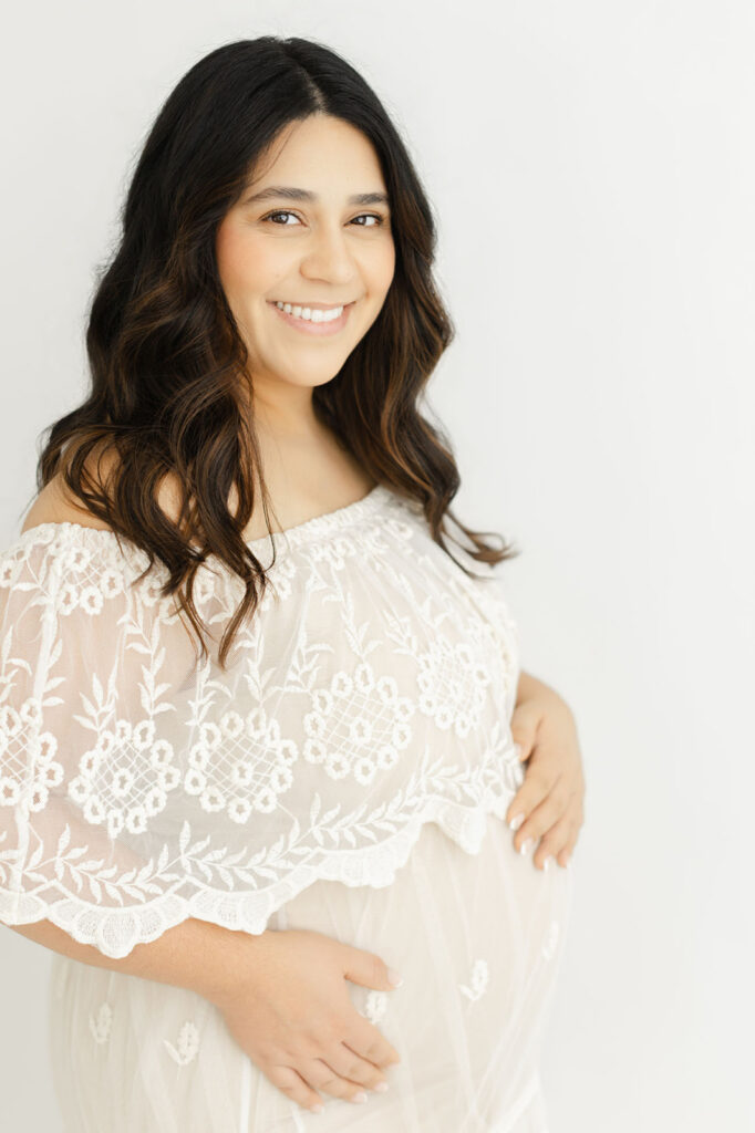 Portland maternity photography session featuring a mother and her growing family