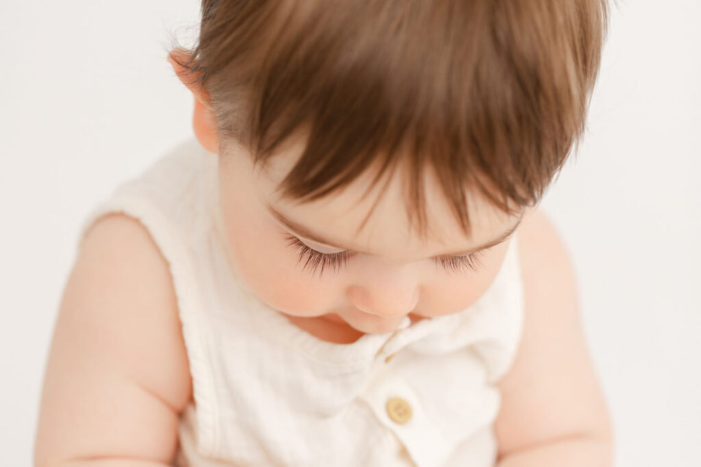 Baby and family portraits documenting the first year of motherhood