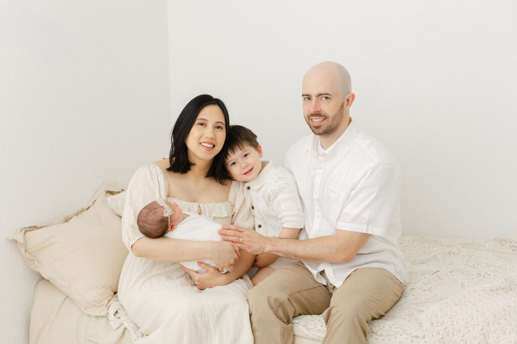 professional newborn photography with sibling portraits